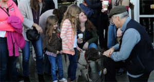 Visitors meet Rico, a truffle-hunting dog