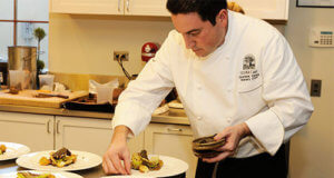 Chef Dominic Orsini at Silver Oak prepping Frisee Salad of Black Truffles